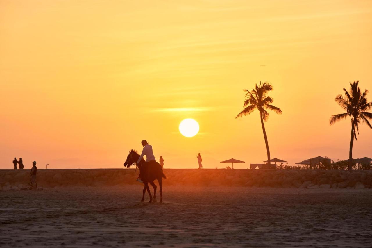 Fanar Hotel & Residences Salalah Exterior photo Sunset at Jumeirah Beach