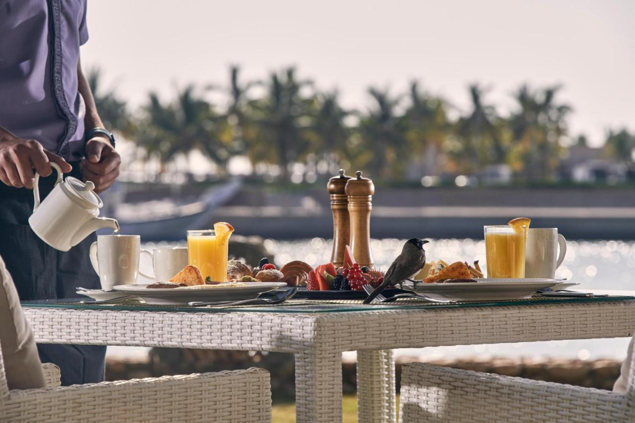 Fanar Hotel & Residences Salalah Exterior photo A breakfast table