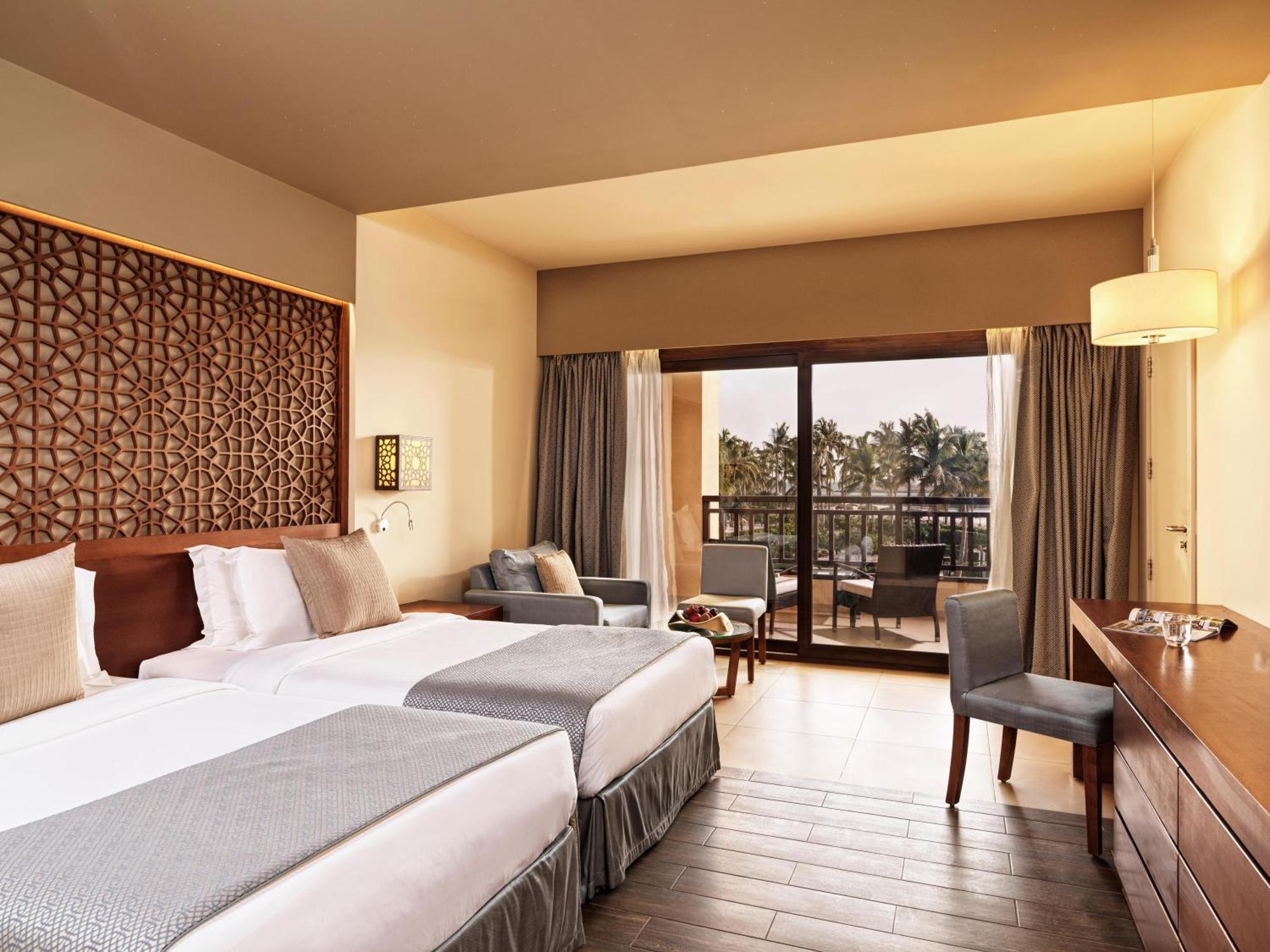 Fanar Hotel & Residences Salalah Exterior photo A room at the hotel