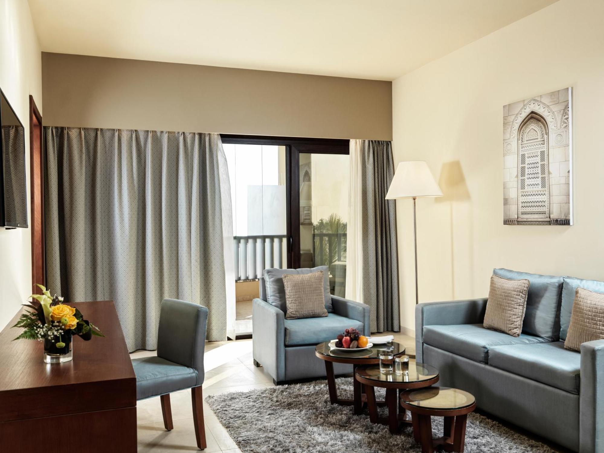 Fanar Hotel & Residences Salalah Exterior photo A living room at the Taj Bengal